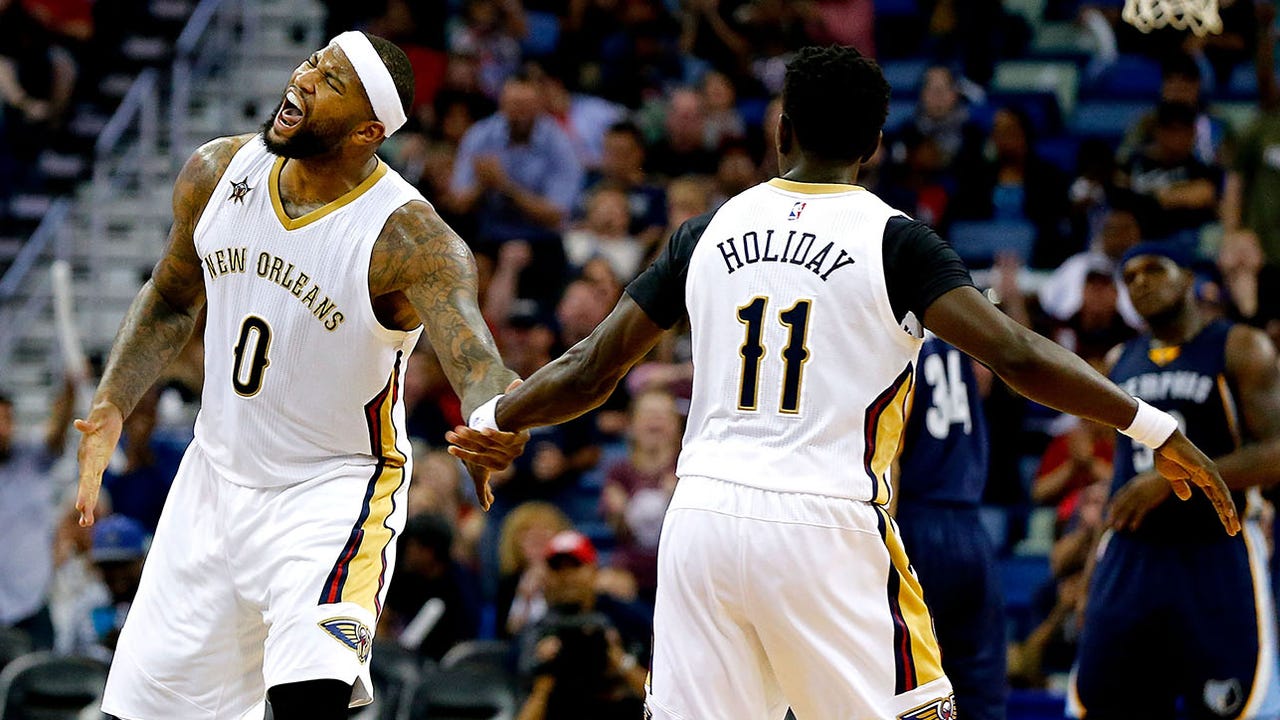After Pelicans lock down Holiday, focus turns to Cousins